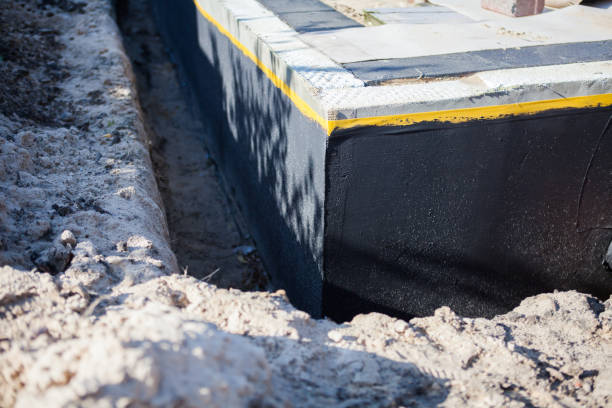 Professional Waterproofing technician working in Collins, OH